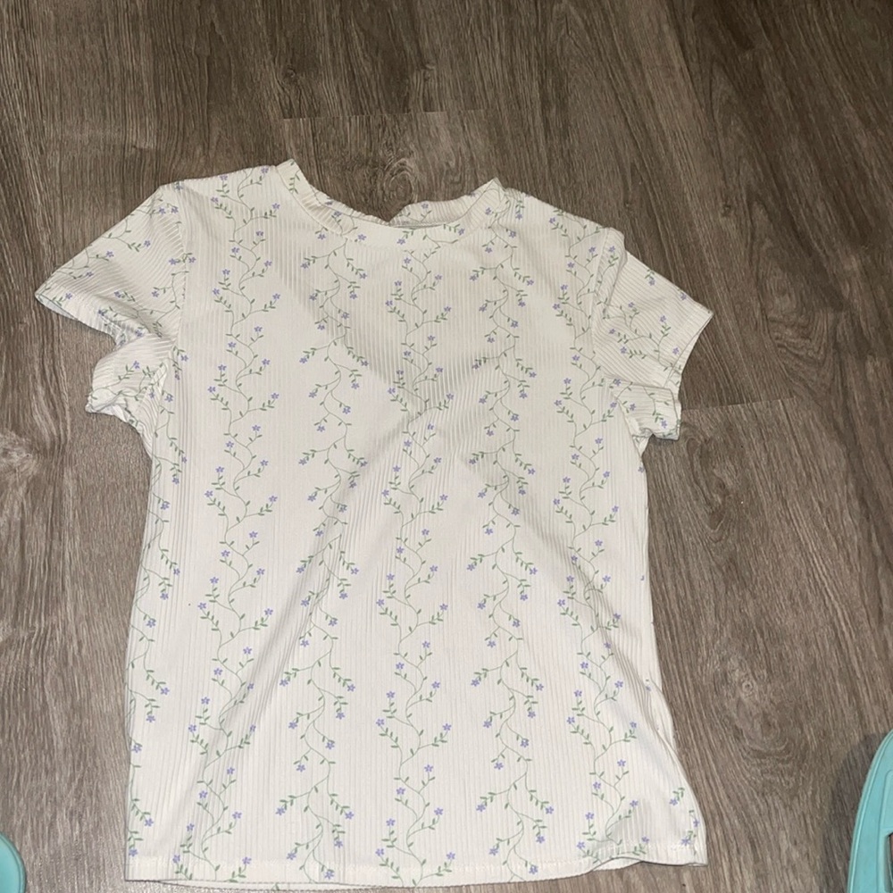 Pull over little baby doll top with flower details